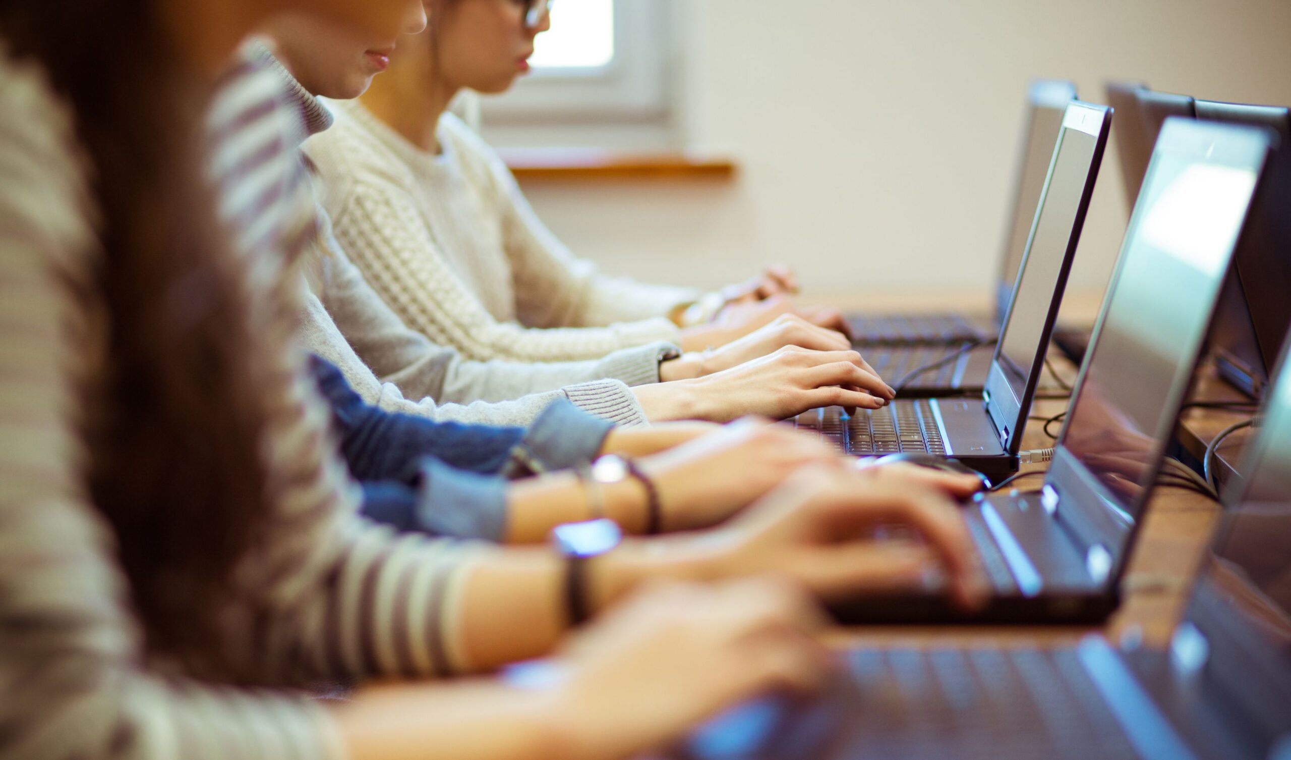 students using laptops